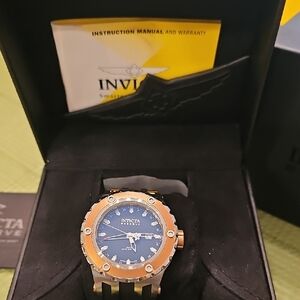 Invicta Watch with Black Face and Gold Bezel